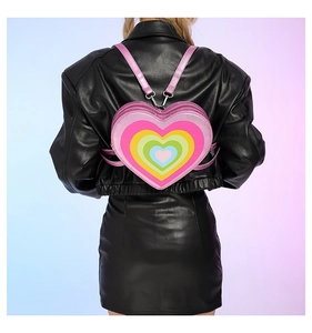 Detail of a colorful heart-shaped rainbow backpack with layered PU leather and thin straps