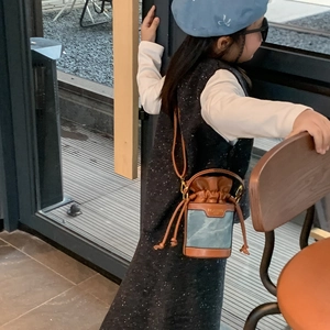 Chic color-block mini bucket bag for kids with drawstring closure and slim leather strap