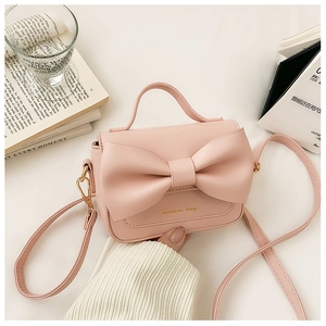 Sac à main rose en cuir PU pour filles avec grand nœud décoratif et détail de lettrage