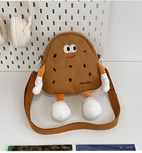 Detailed shot of cute brown cartoon biscuit crossbody bag with adjustable strap