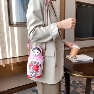 Vintage pink Russian doll crossbody bag with floral pattern and adjustable PU leather strap