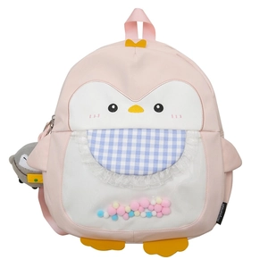 Cute pink penguin backpack for students featuring colorful fur balls and a plush pendant