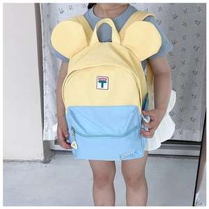 Detail view of colorful kids backpack with decorative ears and contrast color design