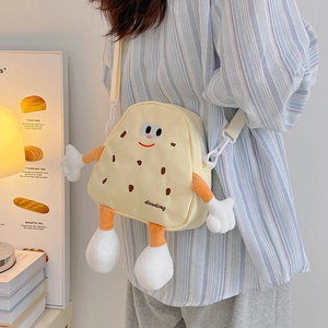 Cute toast-shaped plush crossbody bag for kids with 3D limbs and soft yellow fabric