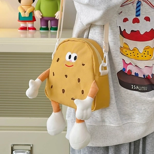 Cute yellow cookie shaped kids crossbody bag with cartoon face and 3D plush limbs
