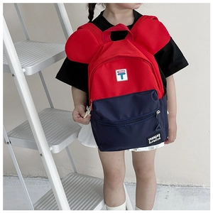 Toddler backpack with cute large round ears and vibrant red and blue color blocking