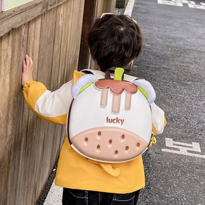 Cute egg-shaped kids backpack with cartoon mangosteen design and lucky text print