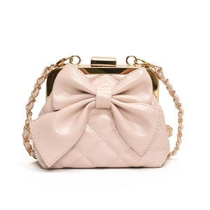 Sac bandoulière rose matelassé pour filles avec grand nœud et chaîne dorée