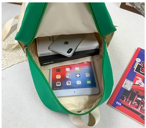 Large capacity school backpack interior showing storage for books and a 10 inch tablet