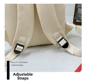 Detail of adjustable thickened shoulder strap and plastic buckle on school backpack