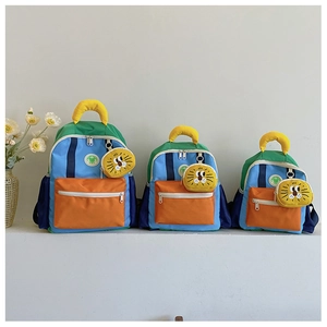 Three sizes of color-block kids backpacks with cute lion charms for school boys and girls