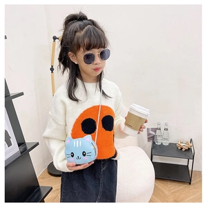 Toddler wearing a cute blue cat crossbody bag made of premium leather material
