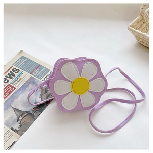 Detail of purple flower children's crossbody bag with daisy decor and thin shoulder strap