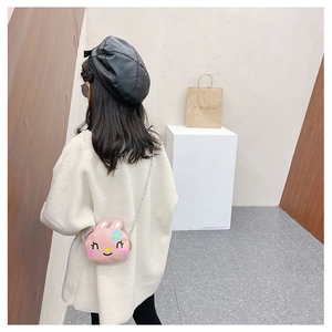 Pink rabbit shoulder bag for kids featuring a cute cartoon face and floral detail