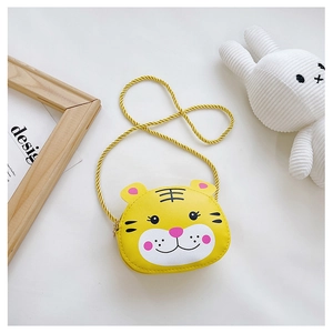 Close-up of a yellow round cartoon tiger crossbody bag for kids with braided rope strap