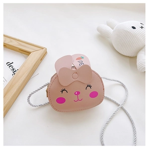 Close-up of pink PU leather rabbit shoulder bag with carrot print and woven rope strap
