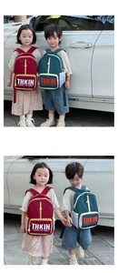 Close-up of stylish color-block backpacks for children with durable canvas material