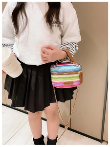 Rainbow woven mini crossbody bag with gold chain strap and brown leather handle