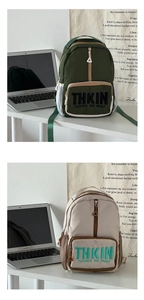 Close-up of durable nylon school backpack featuring embroidered letters and side mesh pocket
