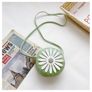 Detail of green round children bag with daisy pattern and floral zipper puller