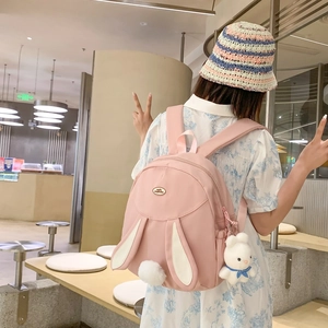 Pink cute rabbit backpack with bunny ears and plush tail accessory for women