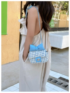 Blue and white tweed crossbody bag for girls featuring a bow and chain strap