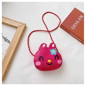 Detail of cute rabbit crossbody bag with floral accents for kids and toddlers