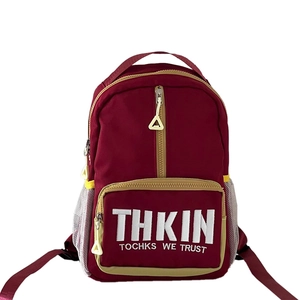 Kids burgundy school backpack with letter embroidery and beige piping accents