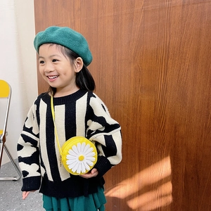 Mini round yellow crossbody bag with daisy floral pattern for kids everyday styling