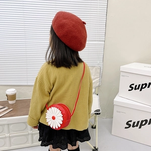 Cute red round kids crossbody bag with white daisy flower detail and PU leather finish
