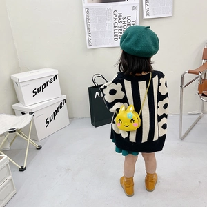 Cute yellow bunny crossbody bag for kids featuring floral accents and a gold strap
