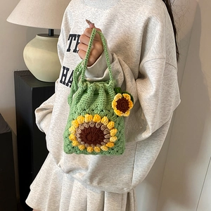 Handmade crochet sunflower crossbody bag in green and yellow knit floral design