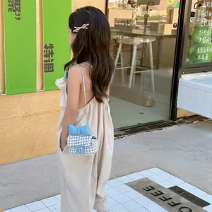 Chic blue plaid tweed crossbody bag for girls with a large bow and chain strap