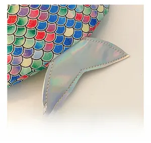 Detail shot of holographic mermaid tail sequins and precision stitching on the kids waist bag
