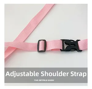 Close-up of the adjustable pink nylon strap with a black plastic buckle for kids waist bag