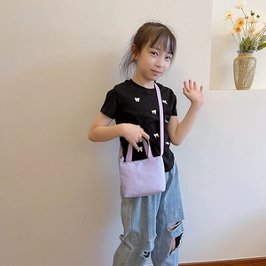 Simple purple canvas mini bag for children with adjustable strap and carry handle
