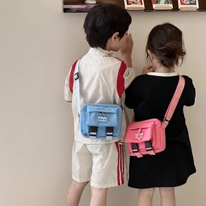Sacs à bandoulière en toile pour enfants en bleu clair et rose avec bretelles réglables