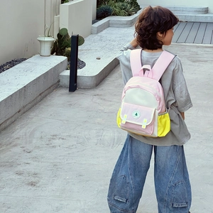 Sac à dos enfant coloré avec design color-block rose et jaune pour école maternelle