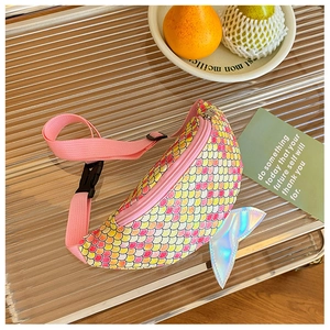Detail of colorful sequined fish-shaped waist bag for kids with holographic tail fin