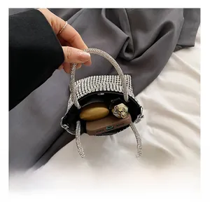 Detail showing internal capacity of sparkling silver rhinestone handbag for children