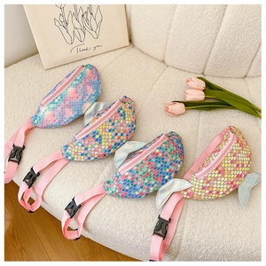 Detail of four colorful sequin mermaid tail waist bags for kids in various gradients