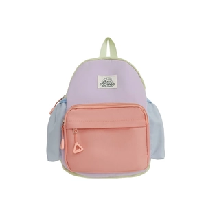 Kids colorful patchwork backpack with camping motif and pastel purple pink tones