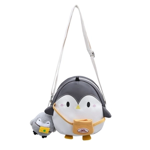 Cute penguin-shaped kids crossbody bag with plush charm and adjustable white canvas strap