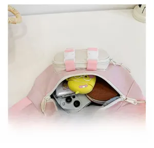 Internal capacity of pink nylon kids waist bag showing phone and accessories storage