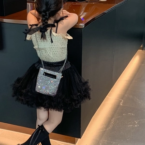 Girl's mini sparkly rhinestone crossbody bag with yellow polka dot top and tutu skirt