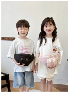 Detail view of stylish kids fanny pack with dual buckle design and adjustable strap