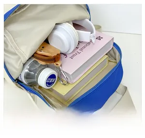 Interior view showing the large capacity of the blue contrast color kids backpack