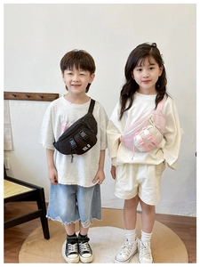 Detail showing kids stylish waist bags in black and pink with durable buckle and strap