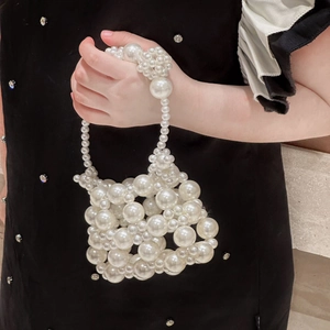 Fashionable girls' hollow woven pearl handbag with elegant geometric white beaded design