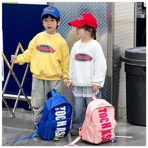 Kids fashion backpacks in blue and pink with large letters for school and outdoor use